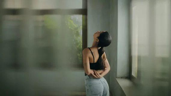 Woman clutching her back in pain