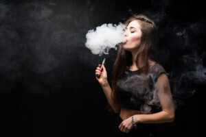 lack-smokes-electronic-cigarette-dark-wall-300x200.jpg