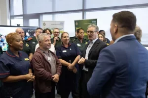 Keir Starmer and Wes Streeting present 10-year NHS plan alongside healthcare workers.