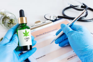 t-bottle-cbd-oil-cannabis-seeds-dry-leaves-300x200.jpg